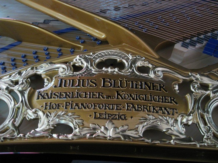 Bluthner piano logo inside grand soundboard